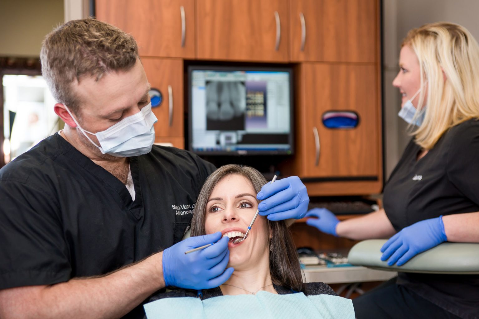 Teeth Cleaning Being Performed by Dentist